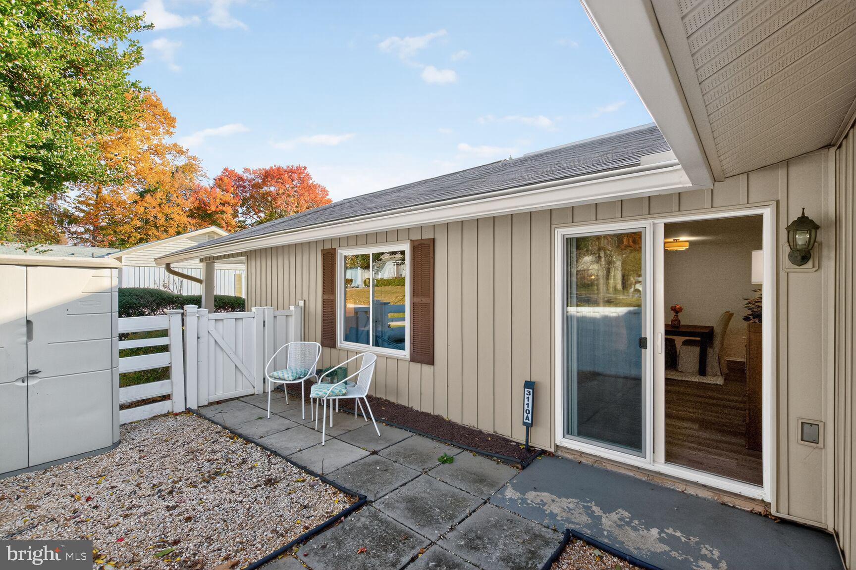 3110 Adderley Court, Unit 245A Silver Spring, MD 20906 - Photo 19 of 31 a view of a house with backyard and sitting area