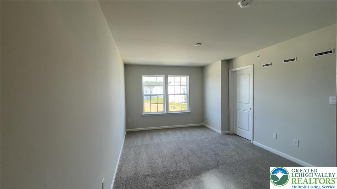 1248 Martin Road Breinigsville, PA 18031 - Photo 30 of 37 a view of an empty room with a window