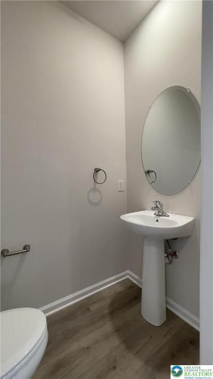 1248 Martin Road Breinigsville, PA 18031 - Photo 31 of 37 a bathroom with a sink toilet and a mirror