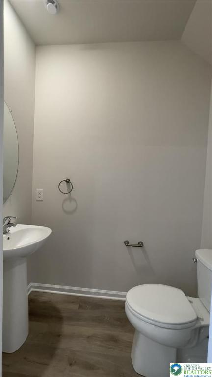 1248 Martin Road Breinigsville, PA 18031 - Photo 33 of 37 a white toilet sitting next to a bathroom sink