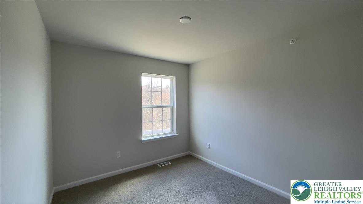 1248 Martin Road Breinigsville, PA 18031 - Photo 5 of 37 an empty room with windows