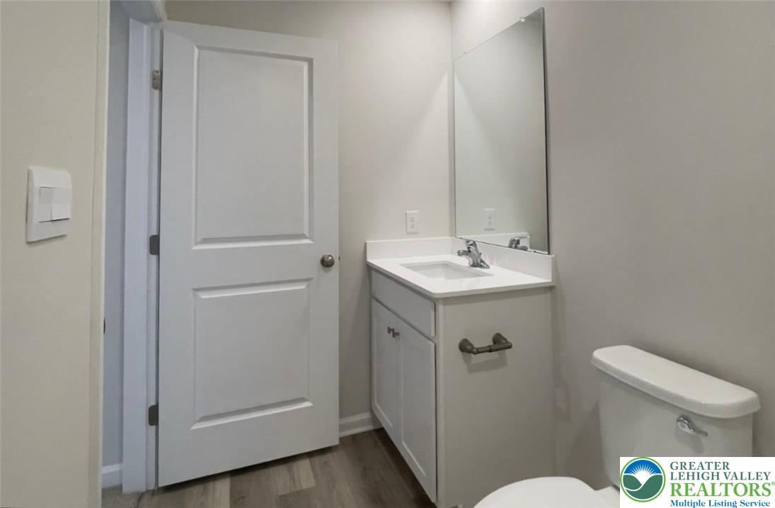 1248 Martin Road Breinigsville, PA 18031 - Photo 8 of 37 a bathroom with a sink a toilet and shower