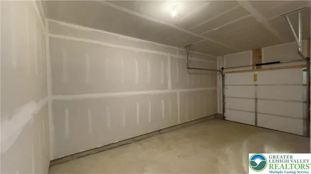 a view of a big room with closet and windows