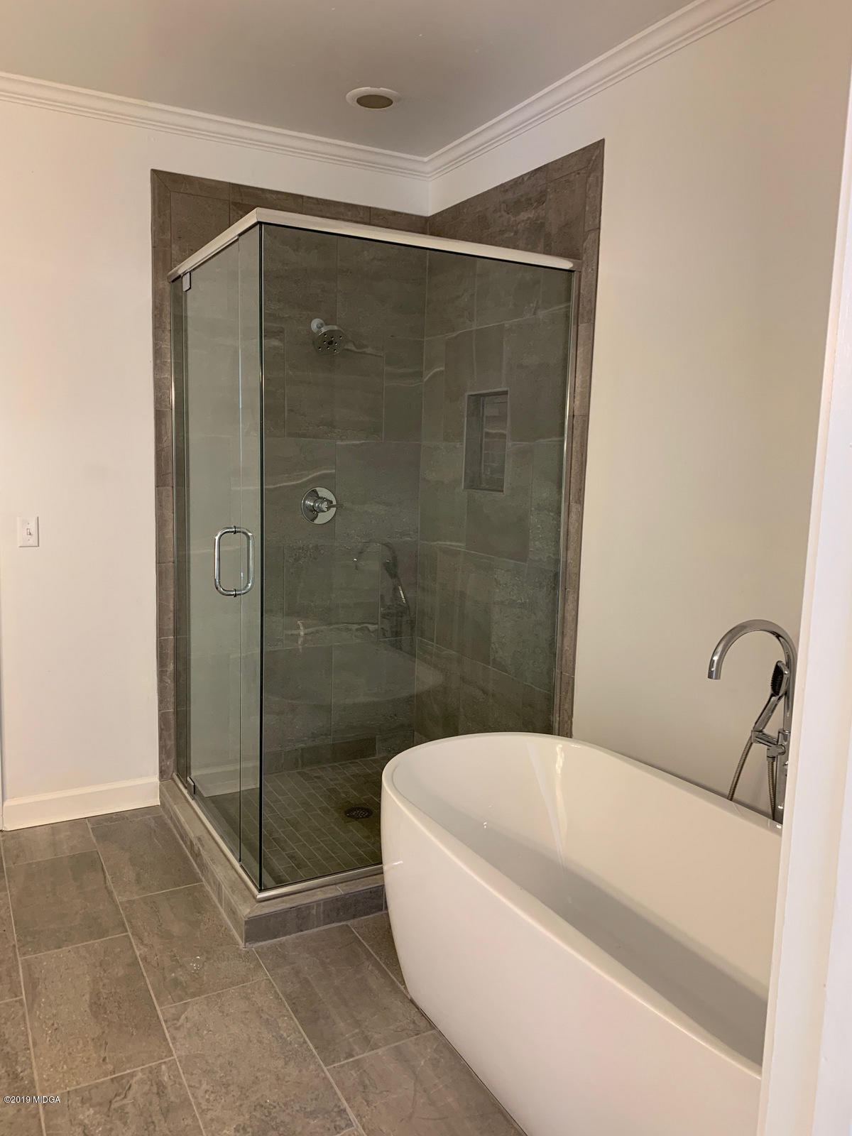 140 Hampton Ridge Road Macon, GA 31220 - Photo 8 of 19 a bathroom with a bathtub and shower