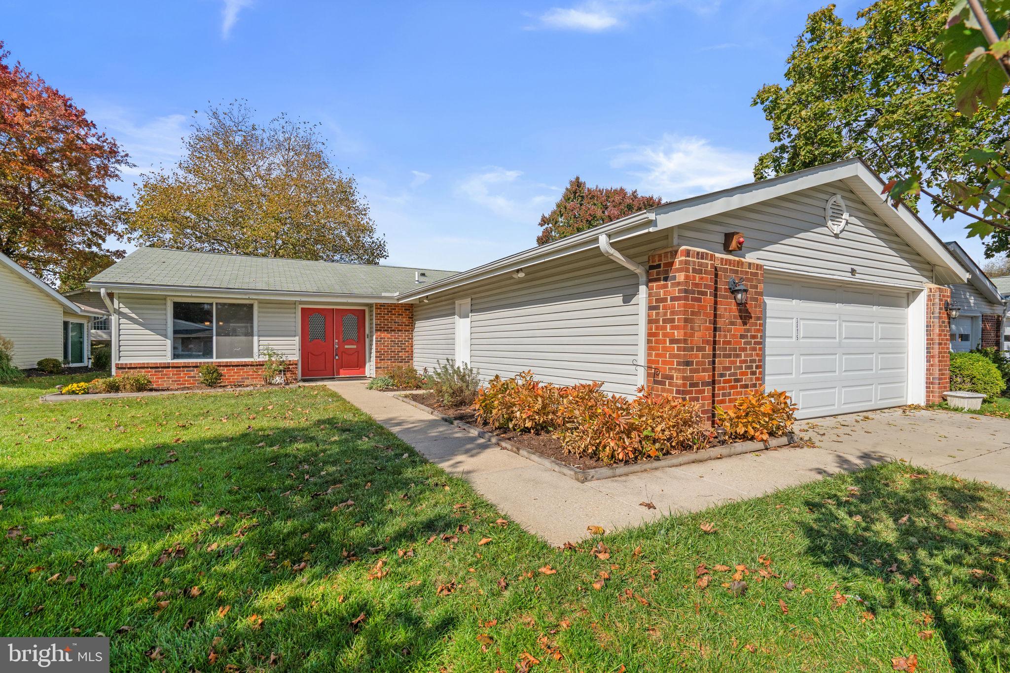 3415 Island Creek Court, Unit 131A Silver Spring, MD 20906 - Photo 2 of 32 a view of a house with a yard