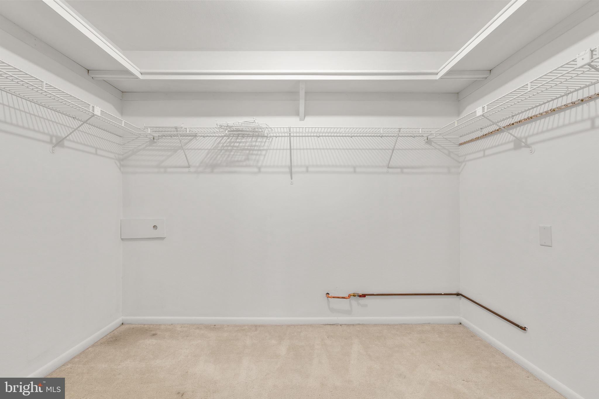 3415 Island Creek Court, Unit 131A Silver Spring, MD 20906 - Photo 21 of 32 a view of a room with shelf