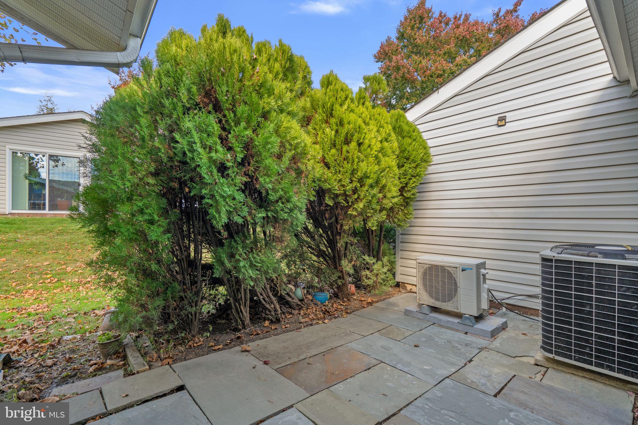 3415 Island Creek Court, Unit 131A Silver Spring, MD 20906 - Photo 29 of 32 a view of a backyard with plants