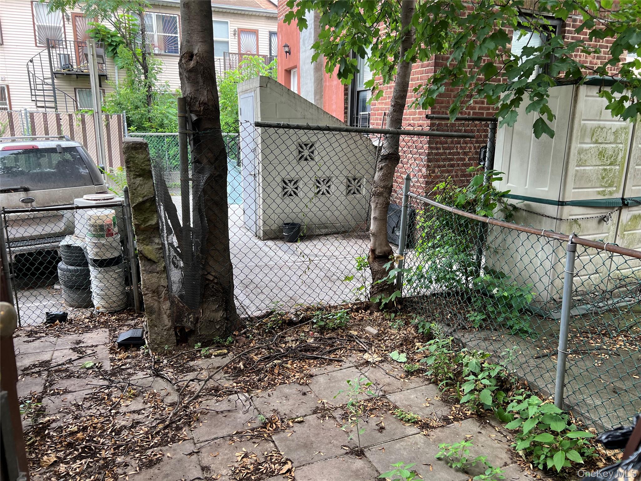 107-04 Guy R Brewer Boulevard, Unit 7A Queens, NY 11433 - Photo 6 of 8 a sign on the side of the road