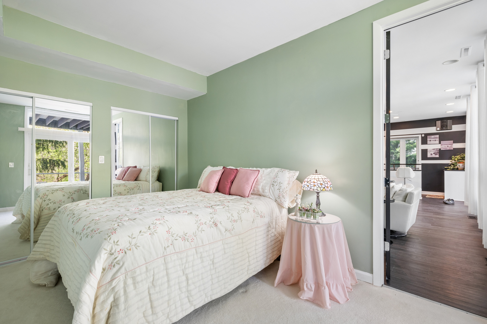 6112 Pleasant View Lane Cary, IL 60013 - Photo 21 of 31 a bedroom with a bed and wooden floor