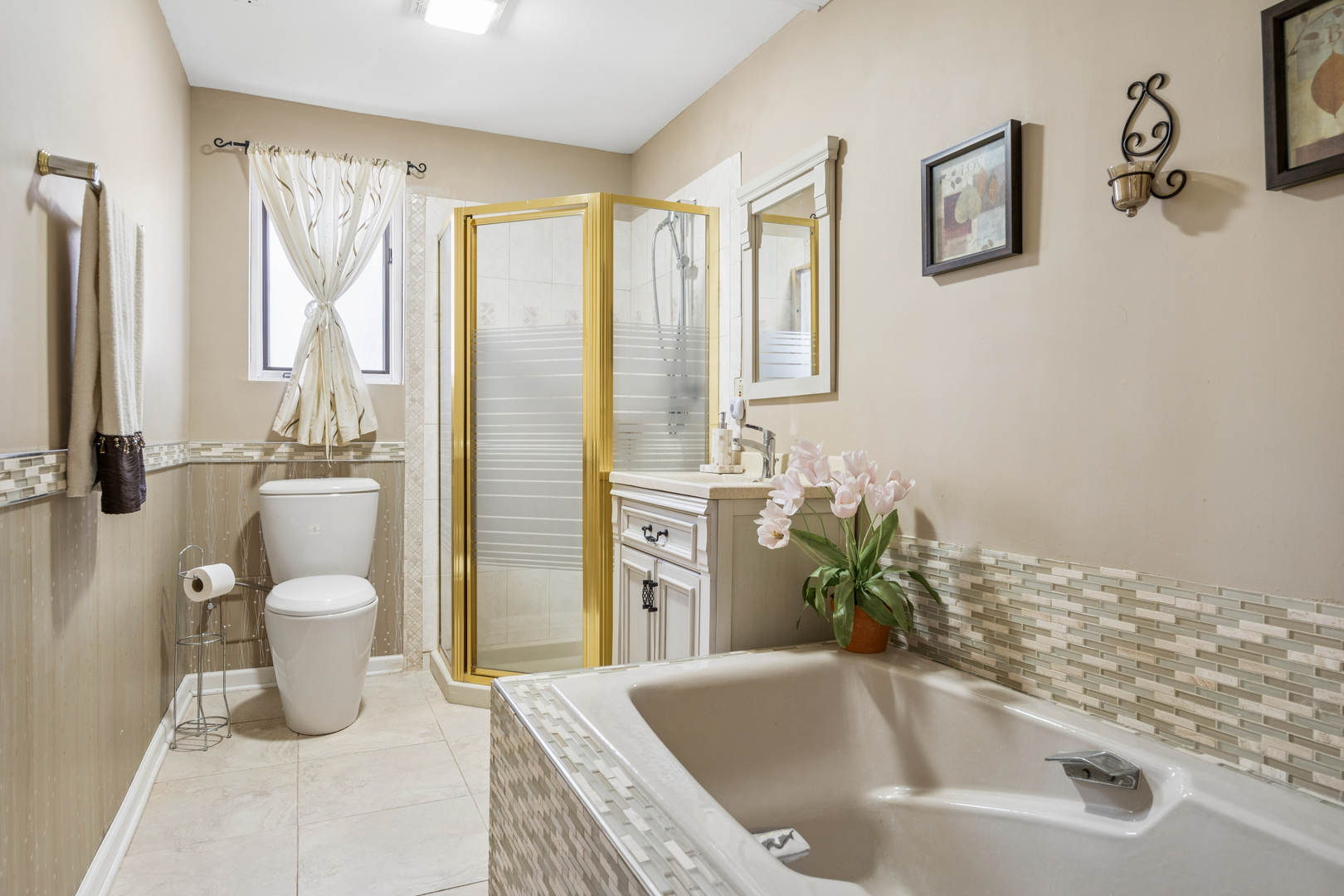6112 Pleasant View Lane Cary, IL 60013 - Photo 22 of 31 a bathroom with a granite countertop sink a toilet and shower