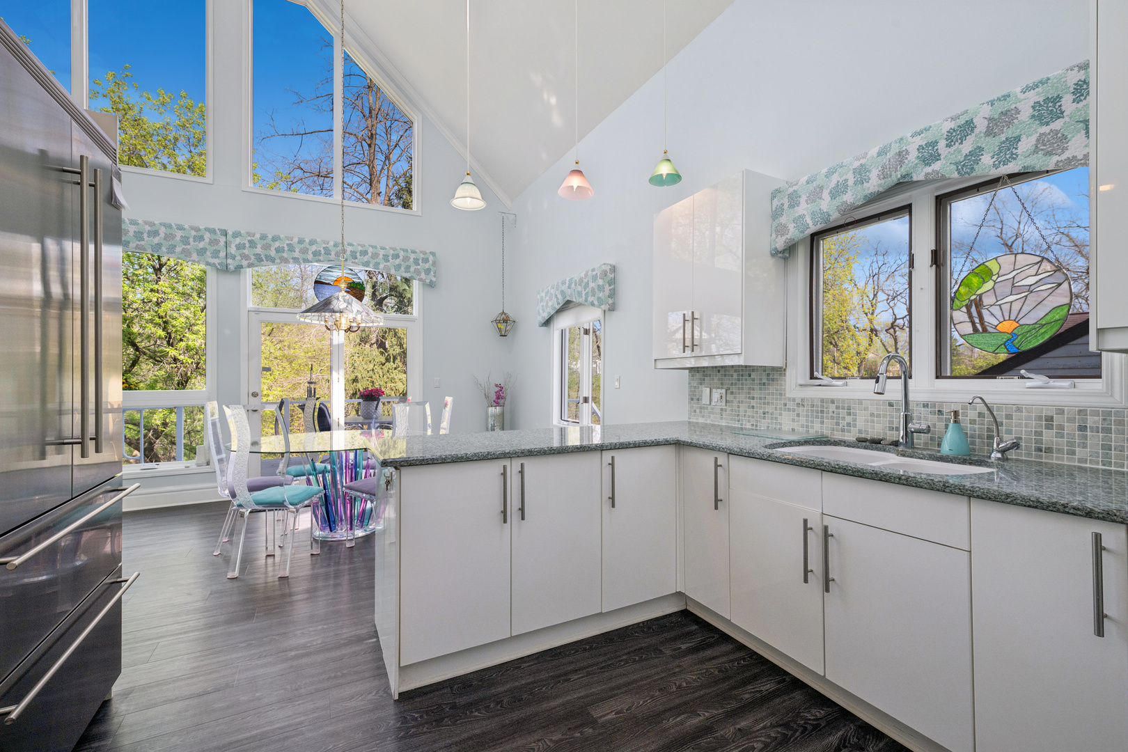 6112 Pleasant View Lane Cary, IL 60013 - Photo 9 of 31 a kitchen with sink cabinets and wooden floor