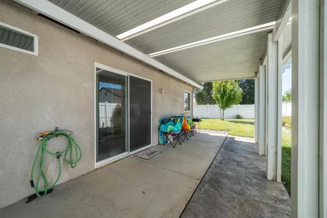 a view of swimming pool with outdoor seating