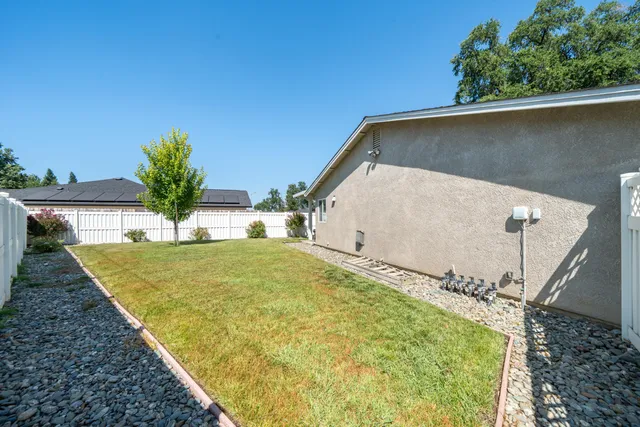 a house with trees in front of it