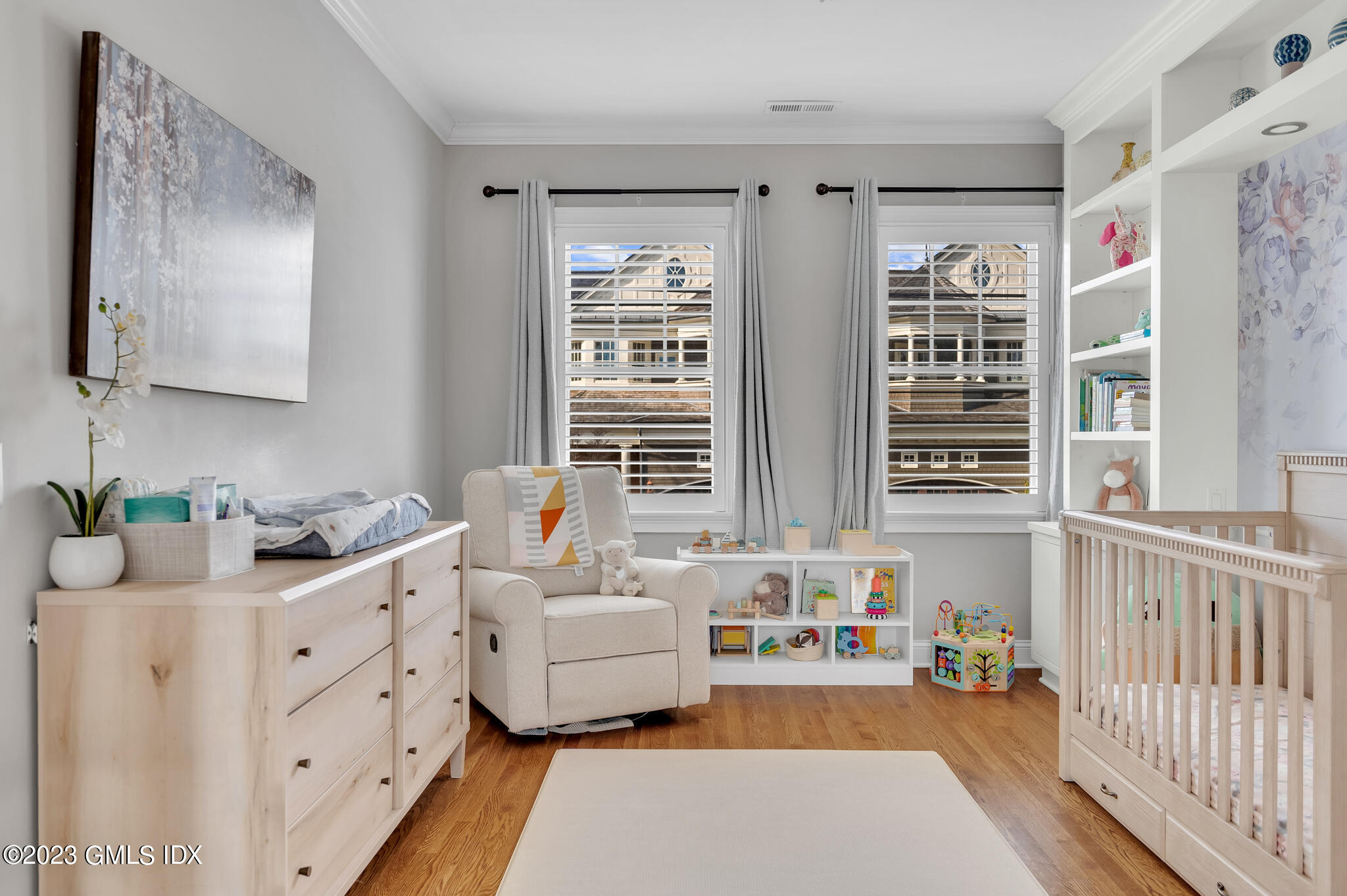 72 Havemeyer Place, Unit B Greenwich, CT 06830 - Photo 13 of 19 a bedroom with furniture and a large window