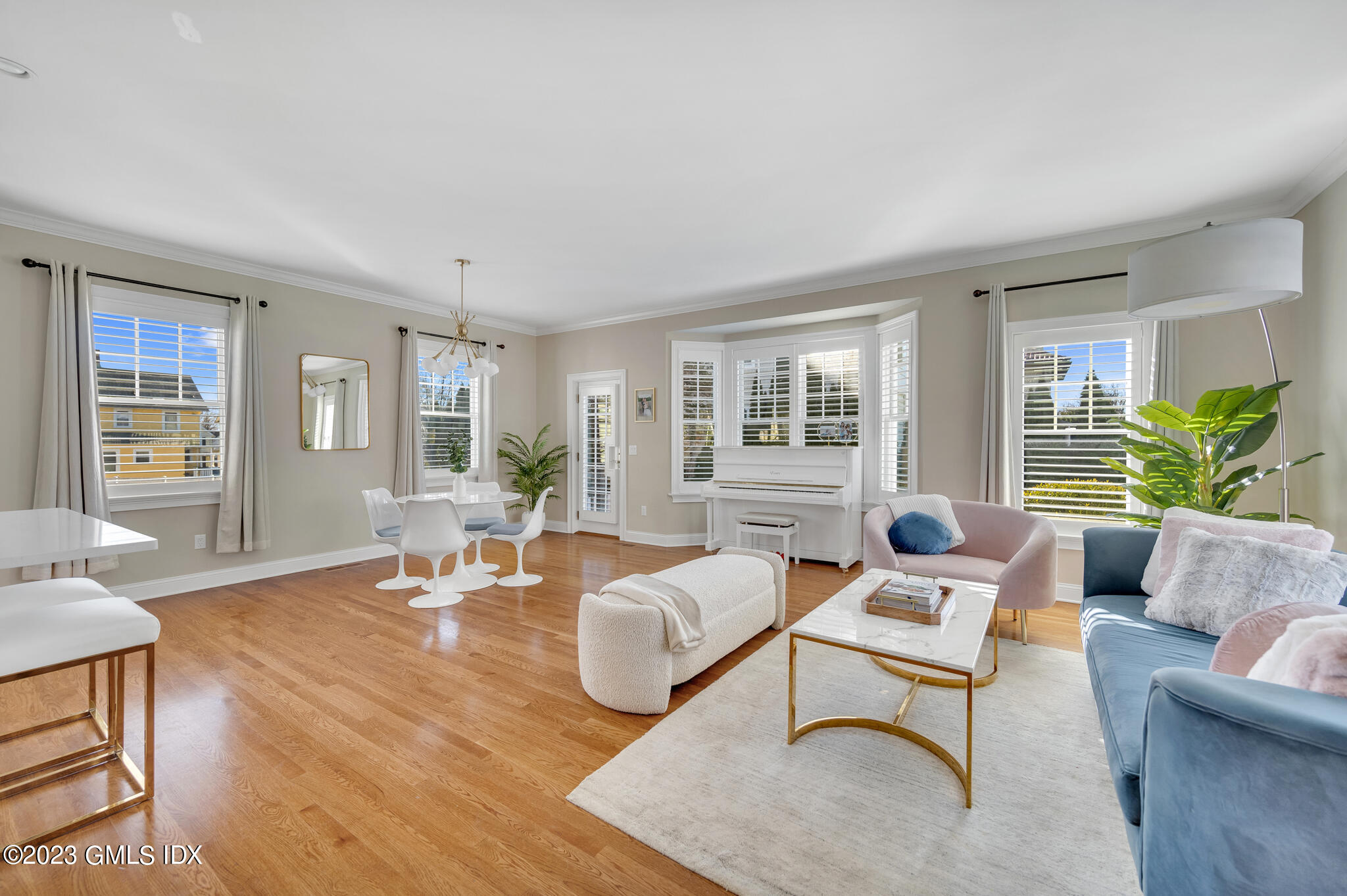 72 Havemeyer Place, Unit B Greenwich, CT 06830 - Photo 3 of 19 a living room with furniture and wooden floor