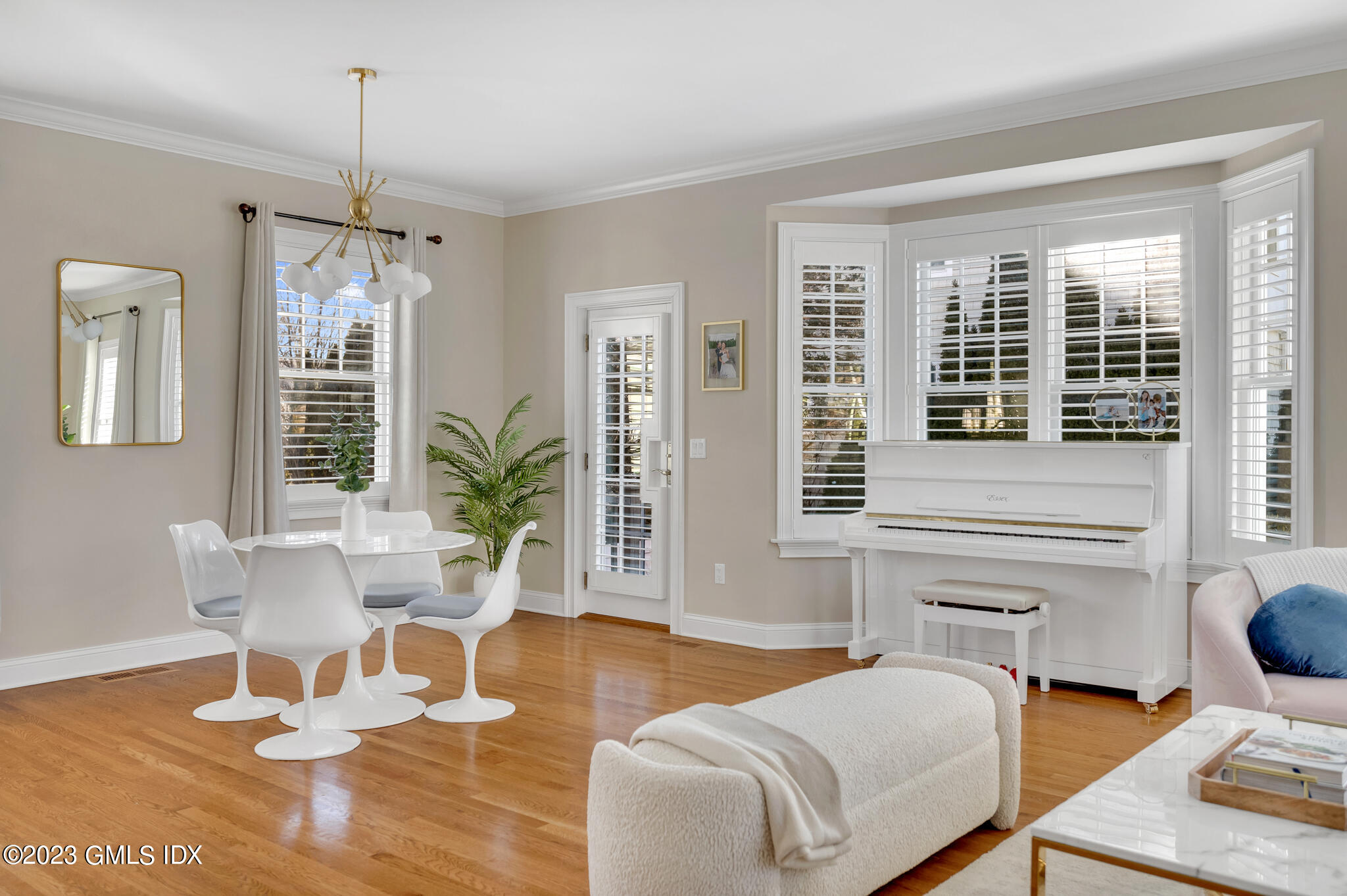 72 Havemeyer Place, Unit B Greenwich, CT 06830 - Photo 4 of 19 a living room with furniture and wooden floor