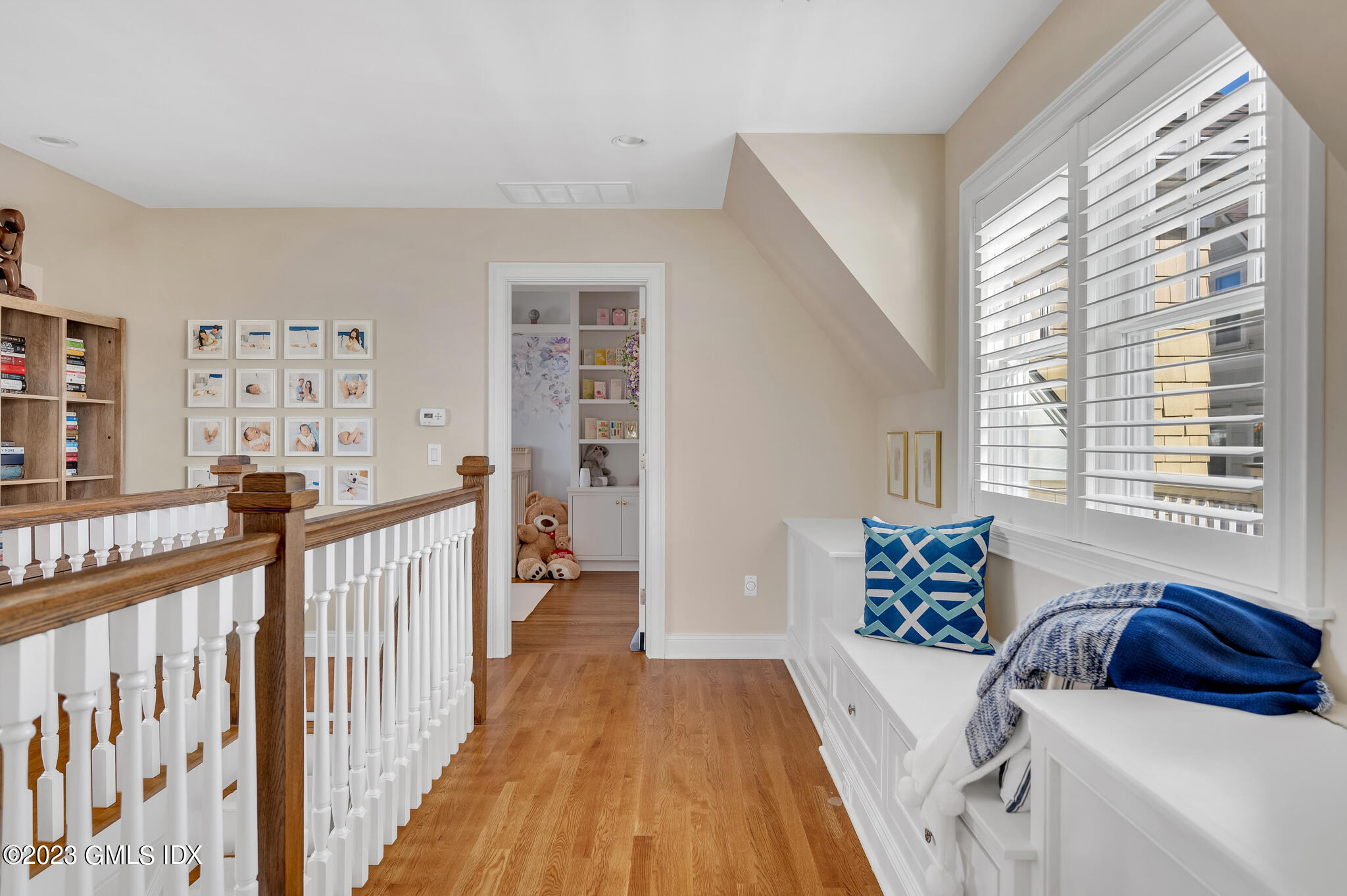 72 Havemeyer Place, Unit B Greenwich, CT 06830 - Photo 10 of 19 a view of a bedroom with furniture and windows