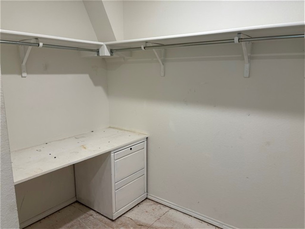 252 Benmyrtle Trail Georgetown, TX 78626 - Photo 12 of 17 a utility room with cabinets