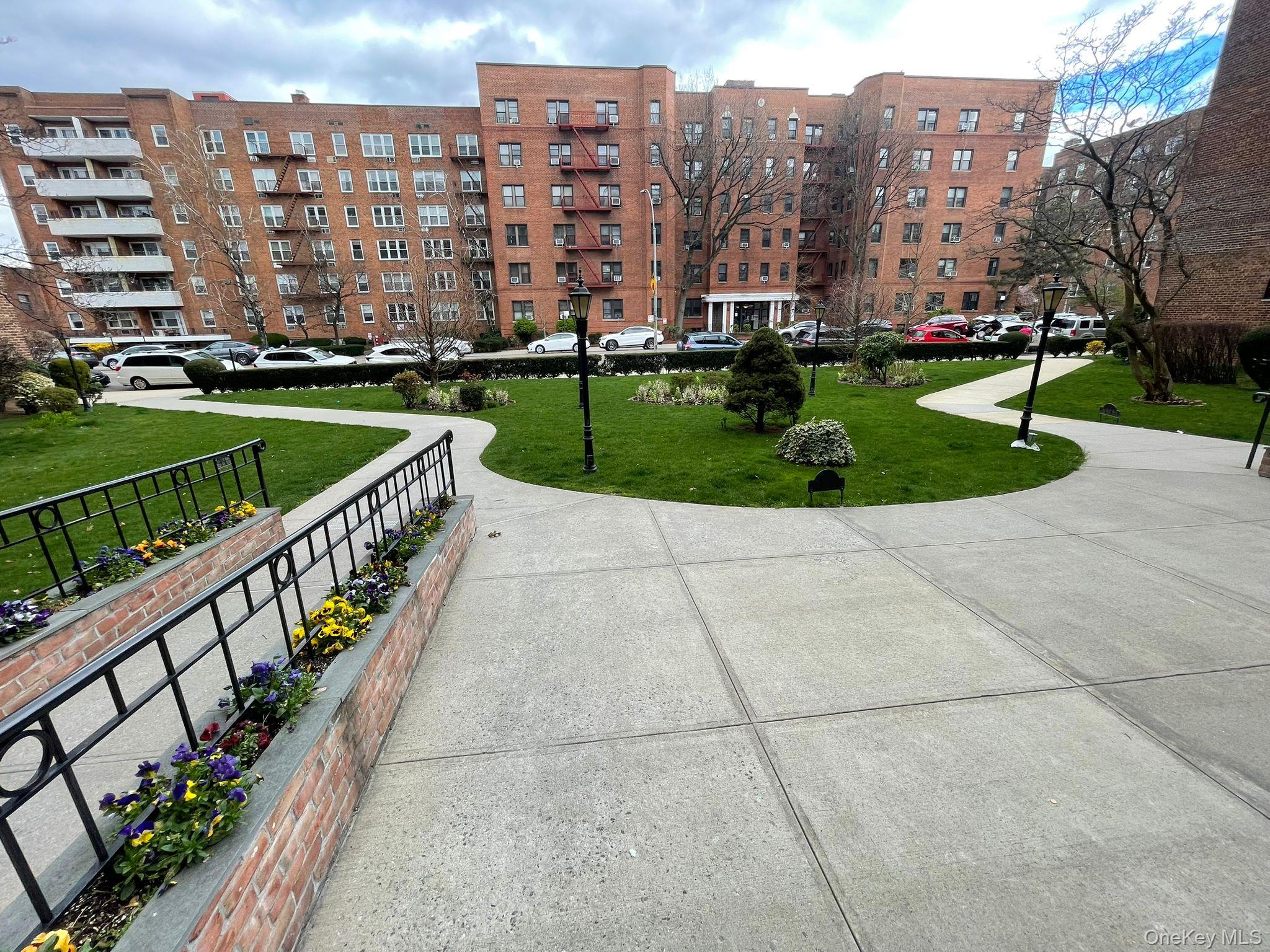 100-11 67th Road, Unit 4 Queens, NY 11375 - Photo 2 of 33 Surrounding community featuring a yard