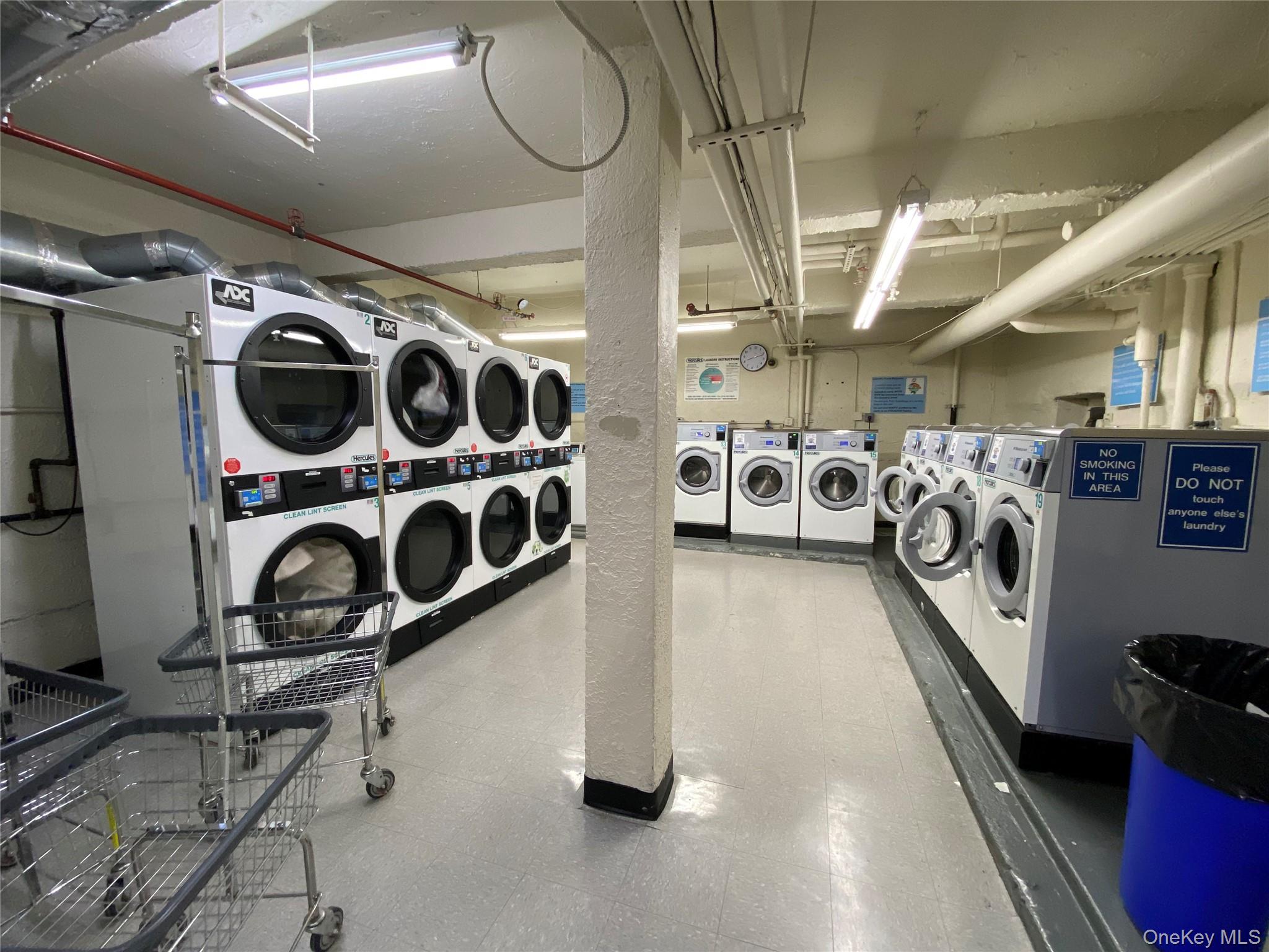 100-11 67th Road, Unit 4 Queens, NY 11375 - Photo 30 of 33 Communal laundry room featuring tile patterned floors and washer and dryer