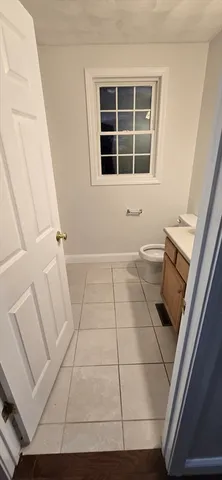 a bathroom with a sink a toilet and a bathtub