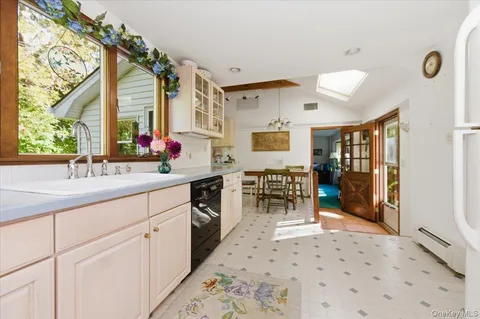 a spacious bathroom with a sink double vanity and a mirror