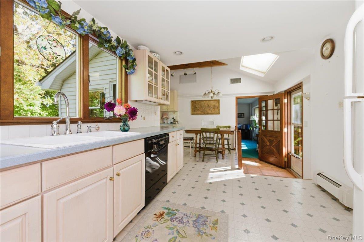 27 Cold Spring Hills Road Huntington, NY 11743 - Photo 12 of 48 a spacious bathroom with a sink double vanity and a mirror