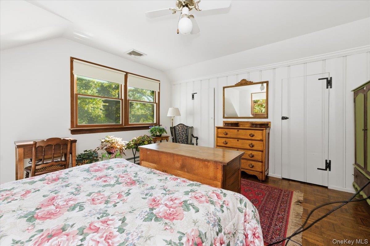 27 Cold Spring Hills Road Huntington, NY 11743 - Photo 23 of 48 a bedroom with a bed and a dresser in it