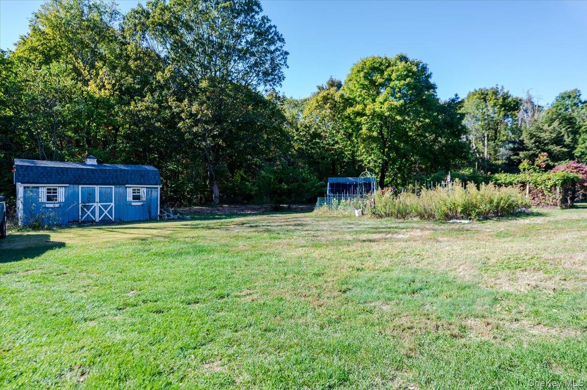 27 Cold Spring Hills Road Huntington, NY 11743 - Photo 25 of 48 a view of a couches in a backyard