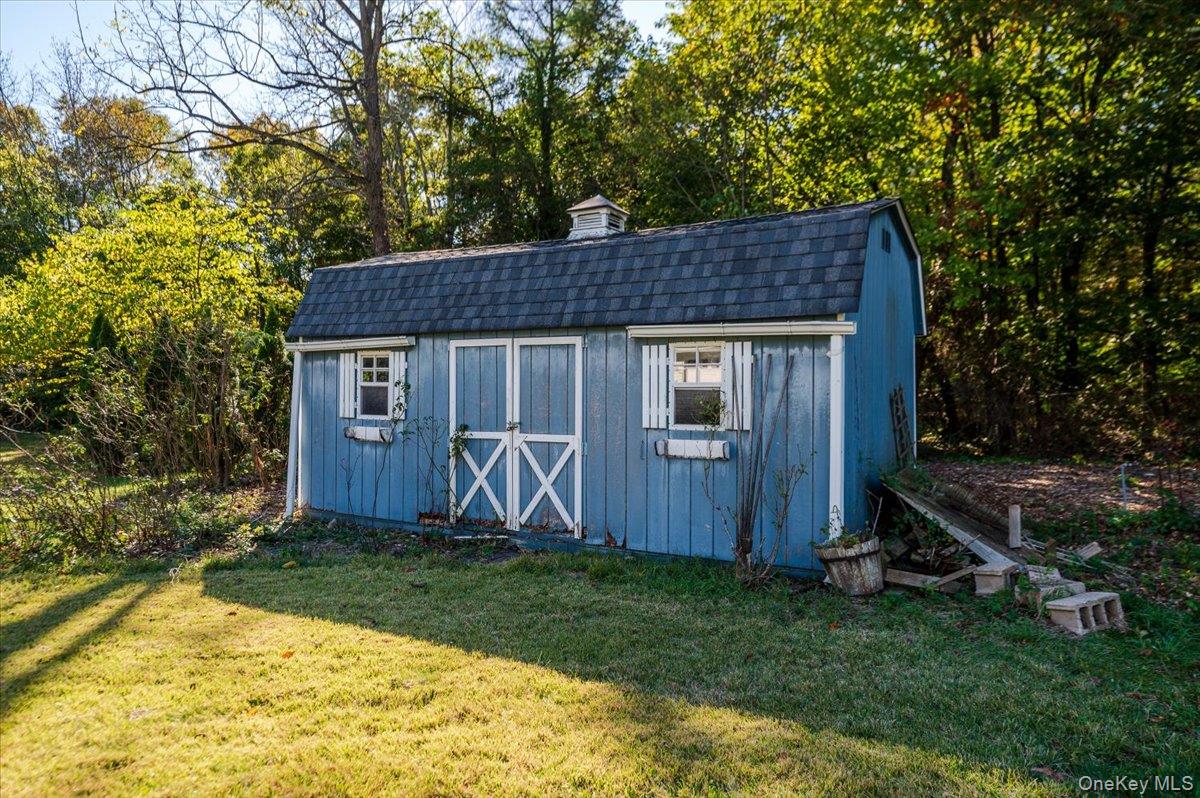 27 Cold Spring Hills Road Huntington, NY 11743 - Photo 26 of 48 a view of a house with a yard