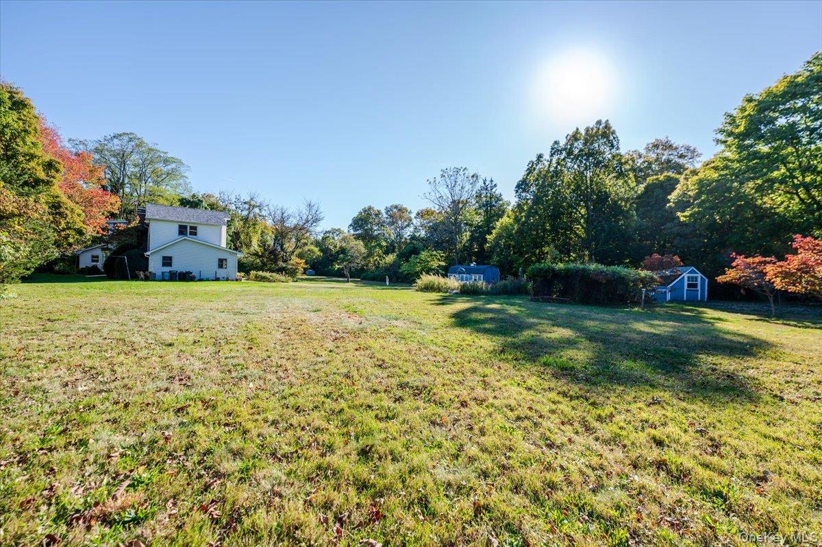 27 Cold Spring Hills Road Huntington, NY 11743 - Photo 29 of 48 a view of a garden with houses