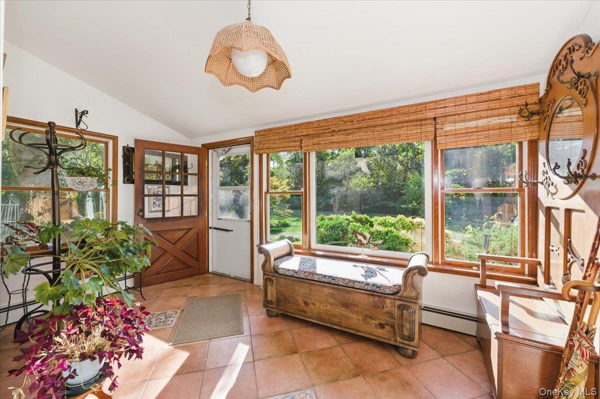 27 Cold Spring Hills Road Huntington, NY 11743 - Photo 3 of 48 a living room filled with furniture and a large window