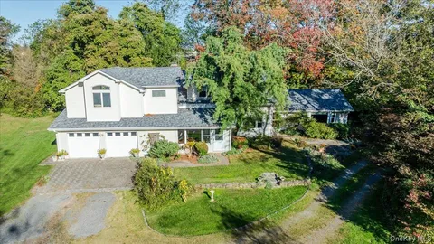 a house view with a garden space