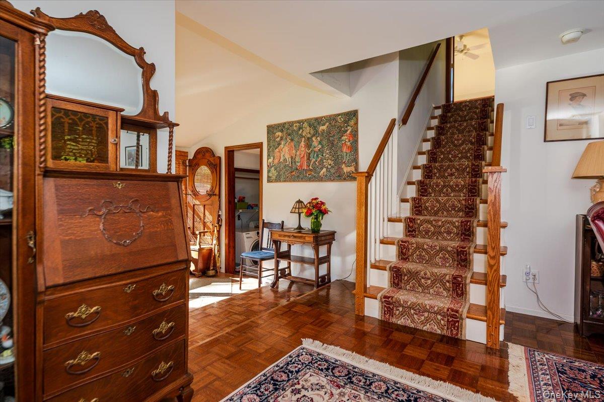 27 Cold Spring Hills Road Huntington, NY 11743 - Photo 4 of 48 a view of a living room with furniture and wooden floor