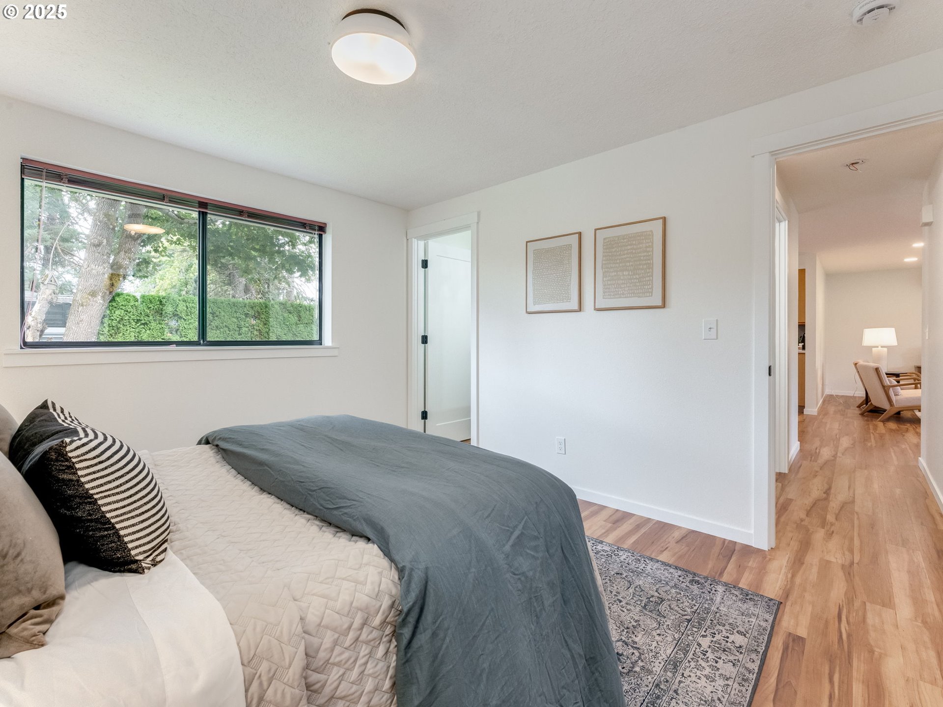 17925 Beebee Court Sandy, OR 97055 - Photo 24 of 48 a bedroom with a bed and a large window