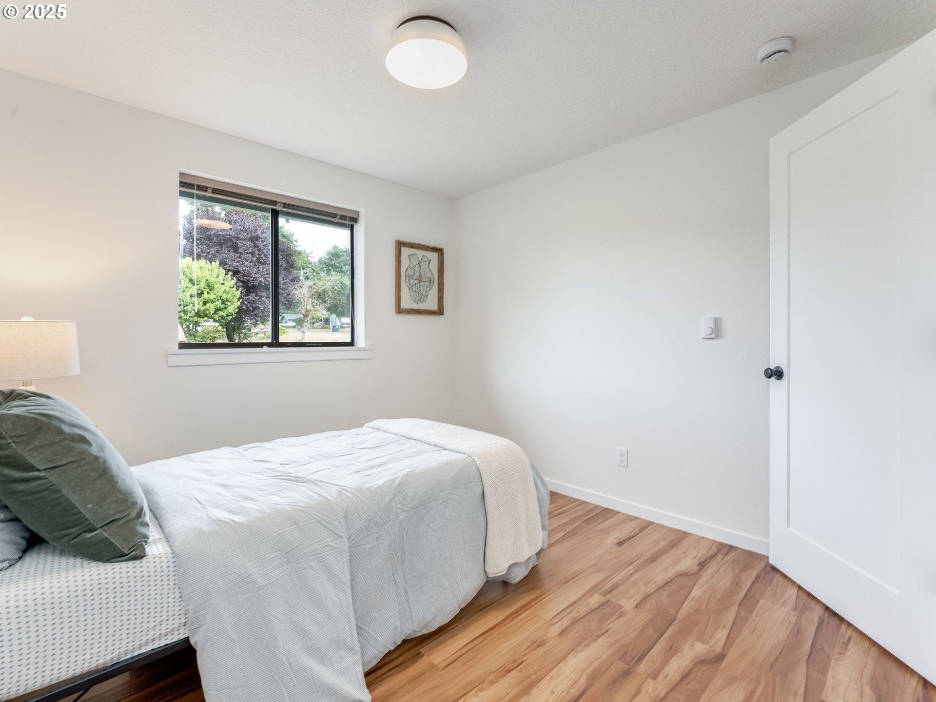 17925 Beebee Court Sandy, OR 97055 - Photo 27 of 48 a bedroom with a bed and a window