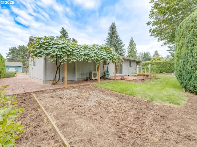 a house with trees in front of it