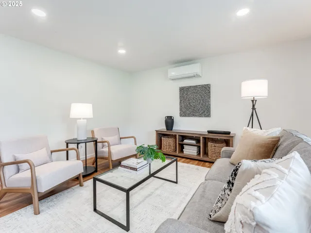 a bedroom with furniture and a table