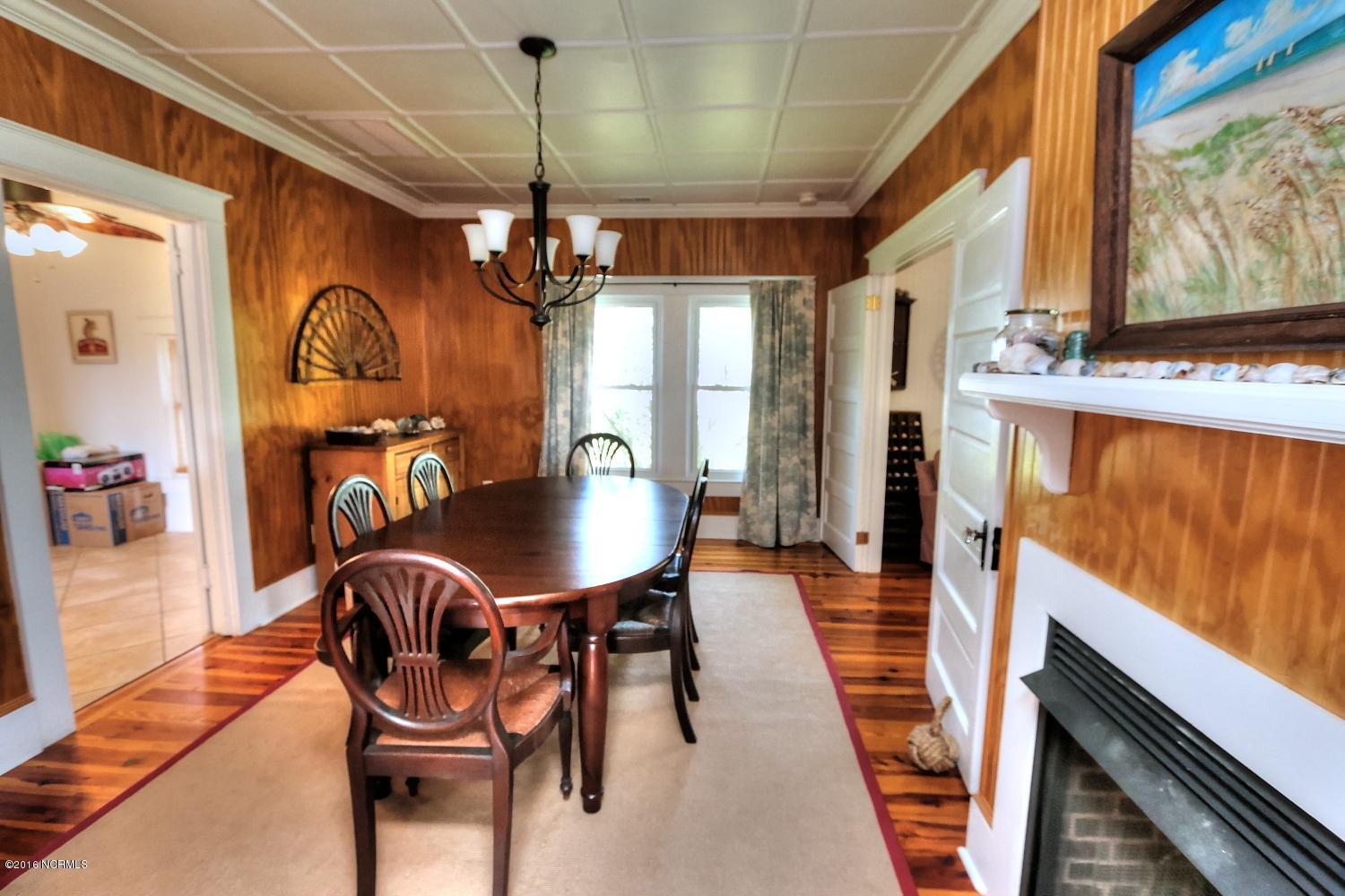 227 Horseshoe Road Davis, NC 28524 - Photo 17 of 74 Formal Dining Room with Fireplace