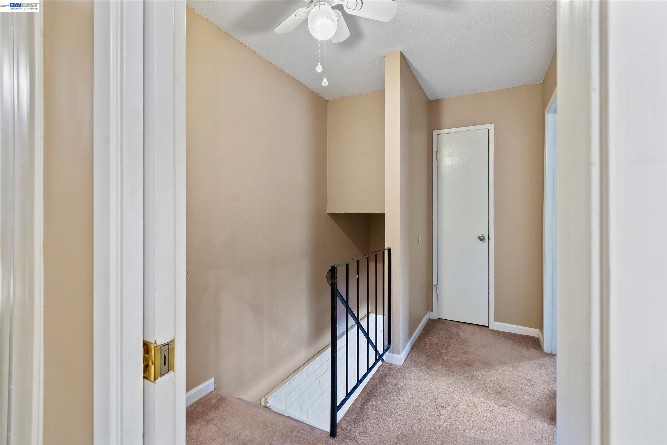 2243 Segundo Court, Unit 2 Pleasanton, CA 94588 - Photo 14 of 22 a view of a hallway with interior of the house