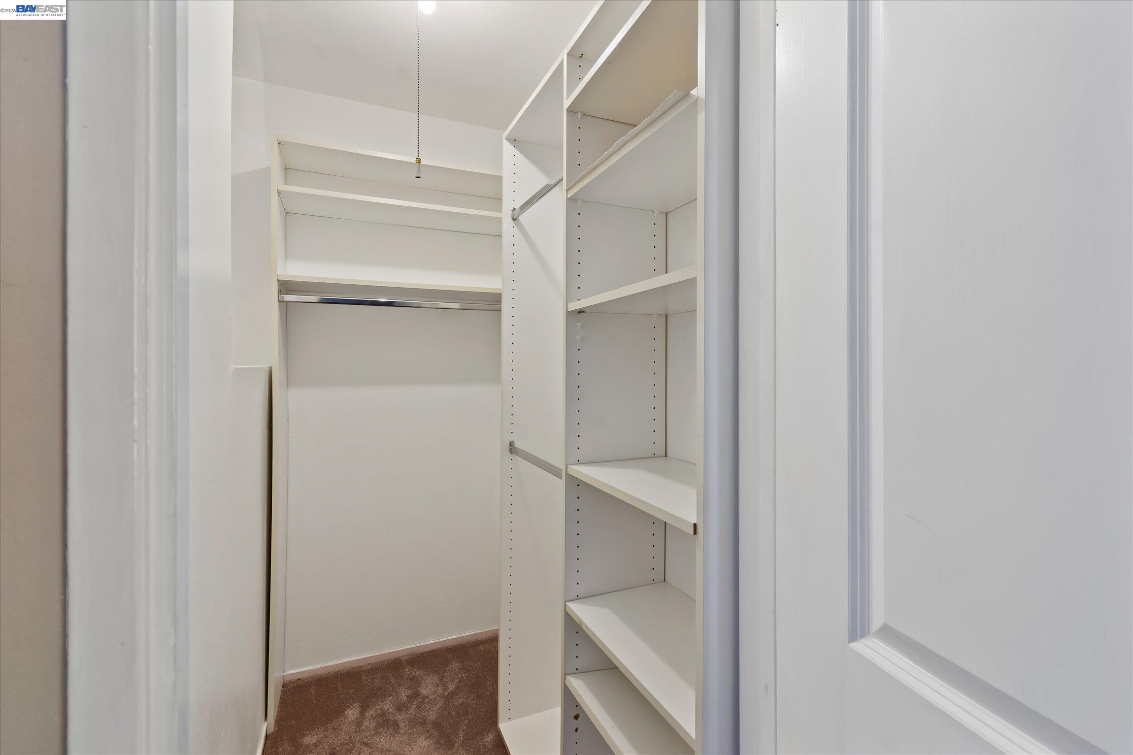 2243 Segundo Court, Unit 2 Pleasanton, CA 94588 - Photo 16 of 22 a view of walk in closet with empty racks