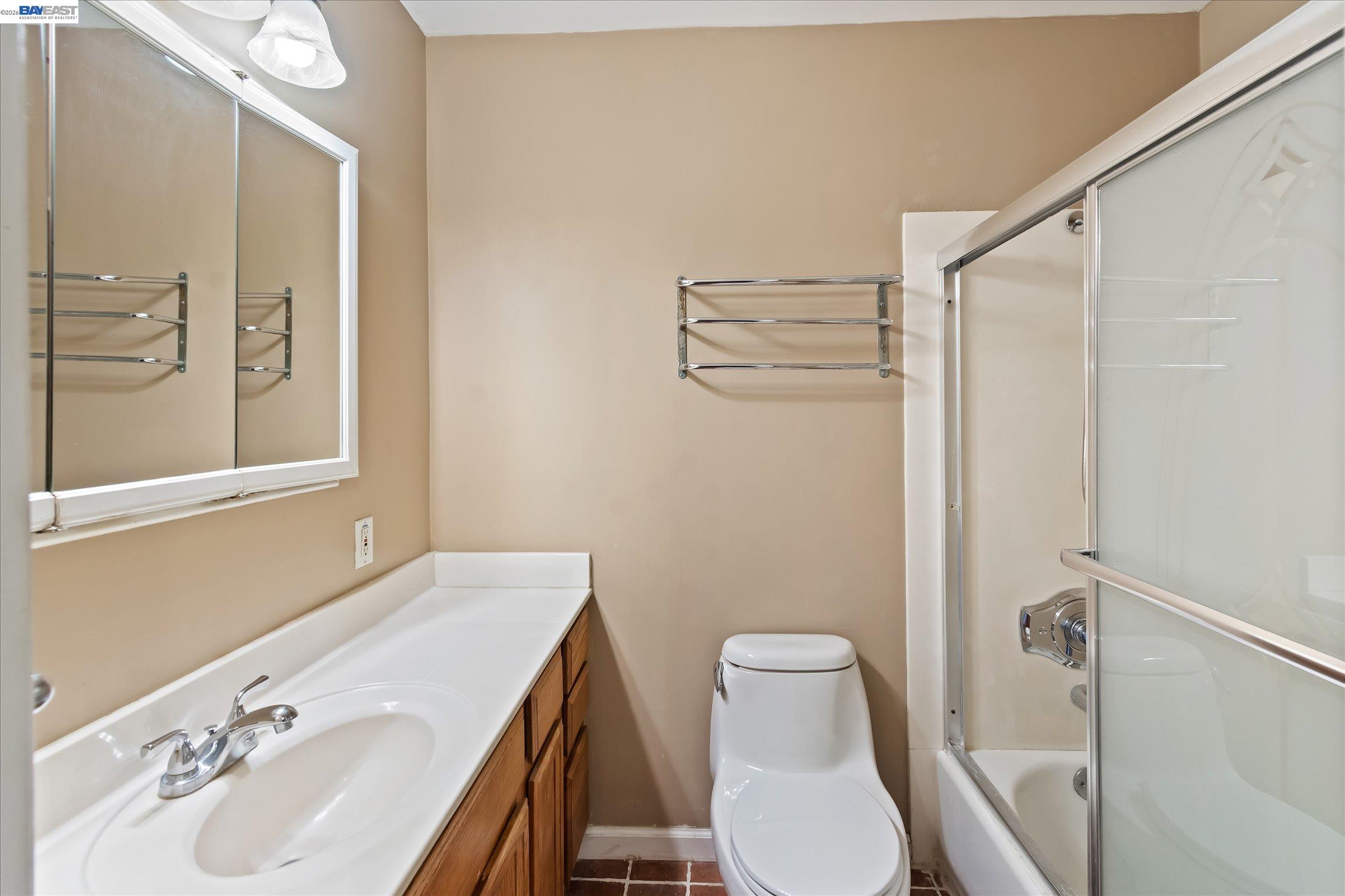 2243 Segundo Court, Unit 2 Pleasanton, CA 94588 - Photo 18 of 22 a bathroom with a sink a toilet and shower