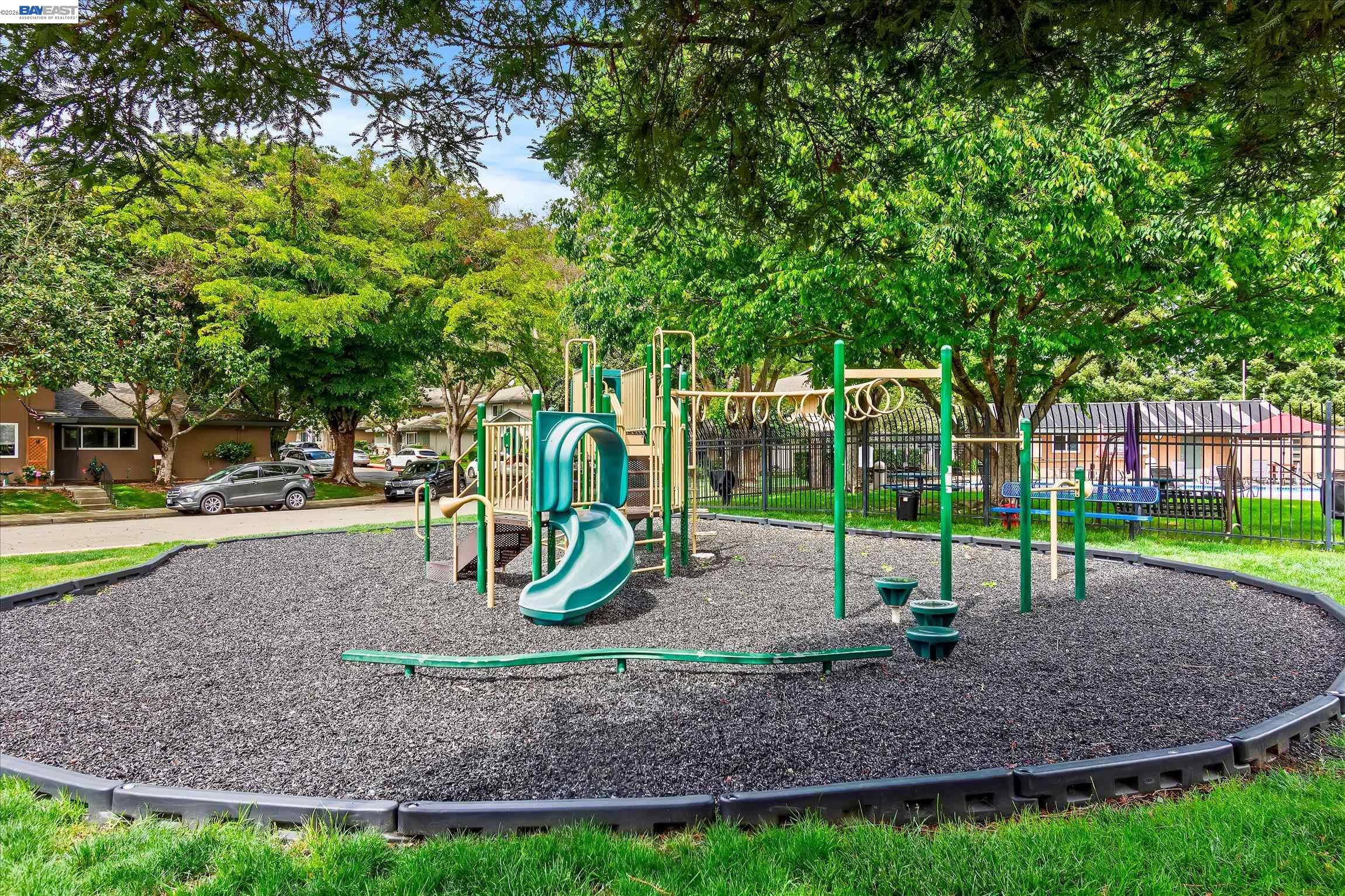 2243 Segundo Court, Unit 2 Pleasanton, CA 94588 - Photo 20 of 22 a view of a park with swings