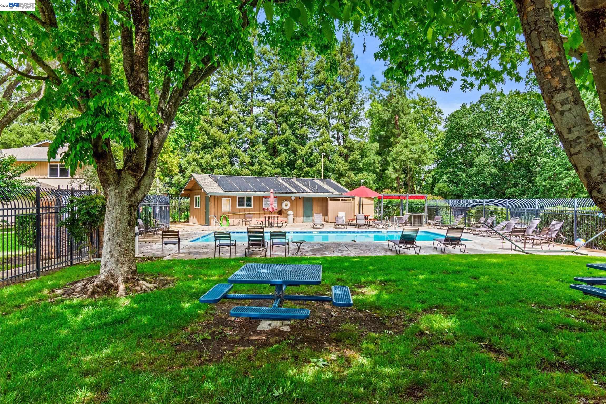 2243 Segundo Court, Unit 2 Pleasanton, CA 94588 - Photo 21 of 22 a view of a house with a yard porch and sitting area