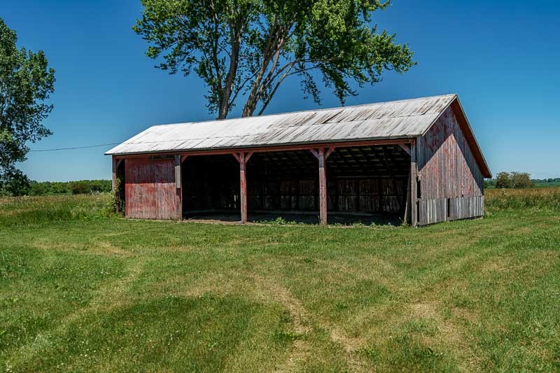 2425 South Conger Road Pecatonica, IL 61063 - Photo 26 of 44 a view of a house with a yard