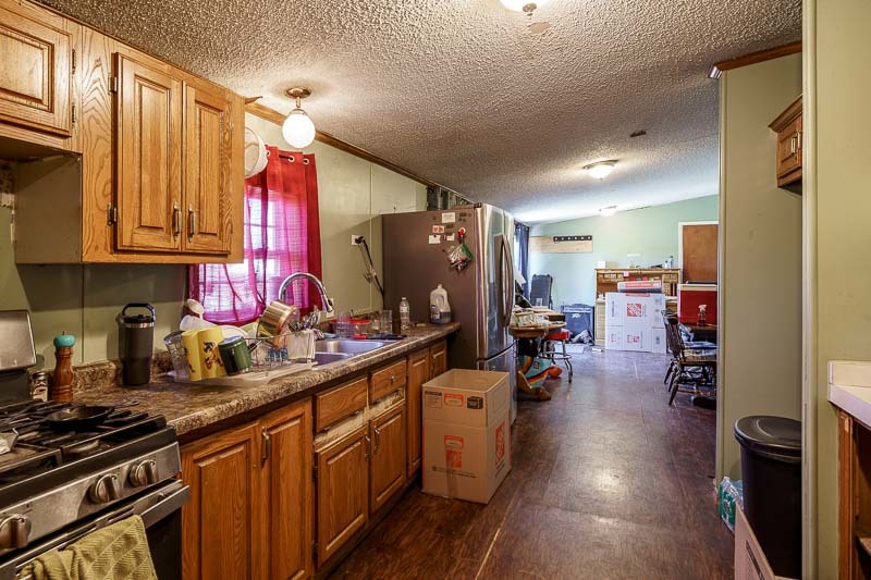 2425 South Conger Road Pecatonica, IL 61063 - Photo 33 of 44 a kitchen with lots of counter top space and appliances