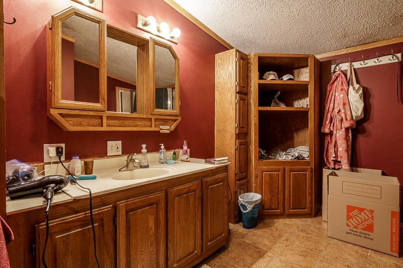 2425 South Conger Road Pecatonica, IL 61063 - Photo 39 of 44 a bathroom with a sink and a mirror
