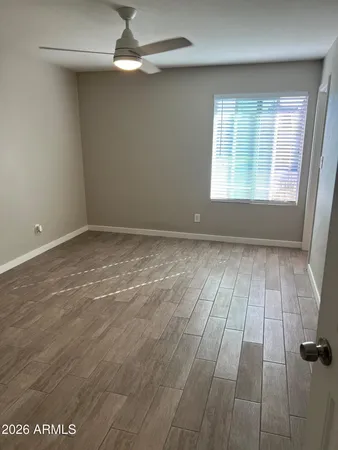 a bathroom with a toilet and a sink