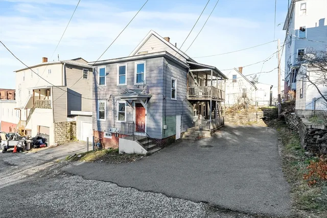 a street view with tall buildings