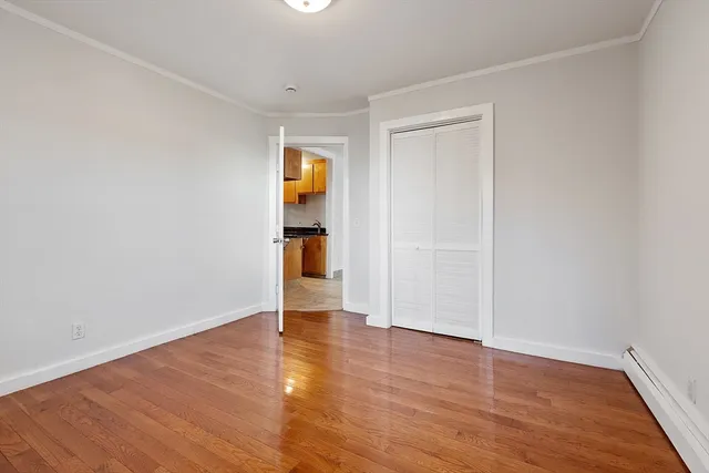 a kitchen with stainless steel appliances granite countertop a sink stove and a refrigerator